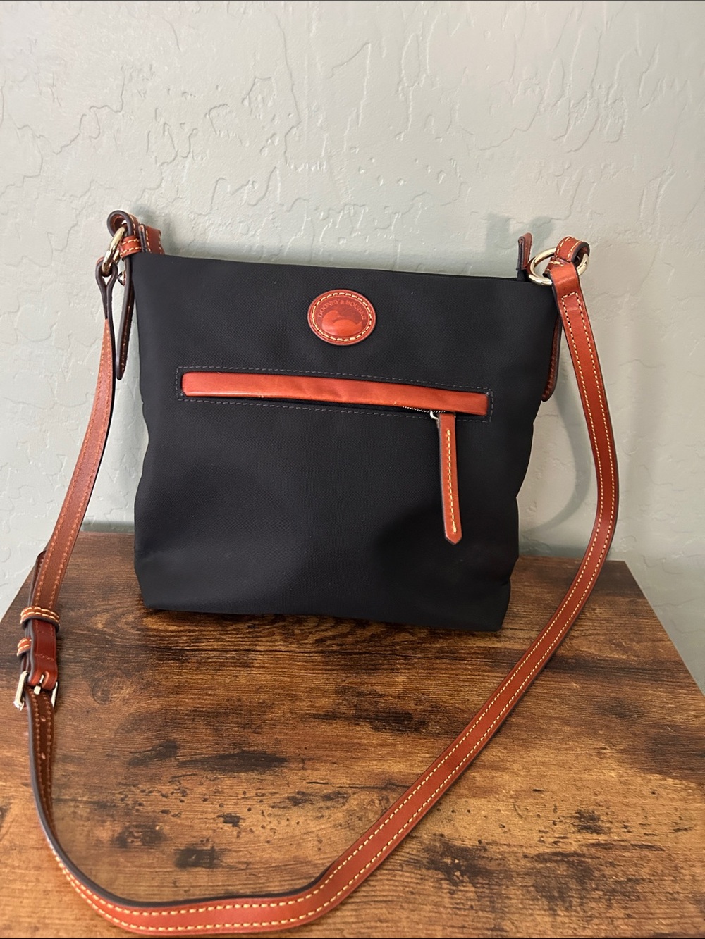 Dooney and Bourke Nylon Leather-Trim women’s Crossbody Bag with Red Interior